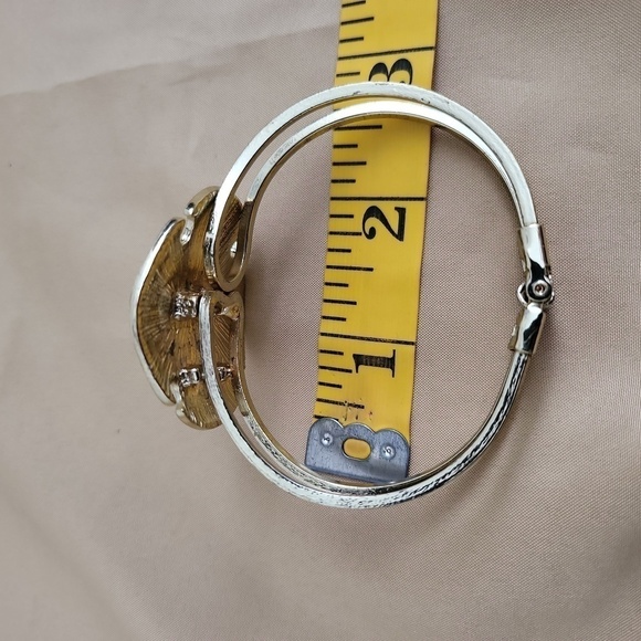 Sand Dollar Goldtone Hinged Cuff Bracelet - Picture 9 of 9